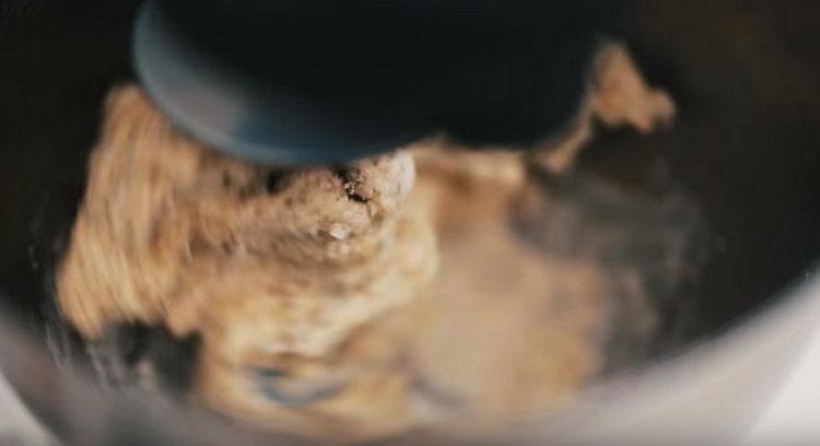 Knead a tough dough.