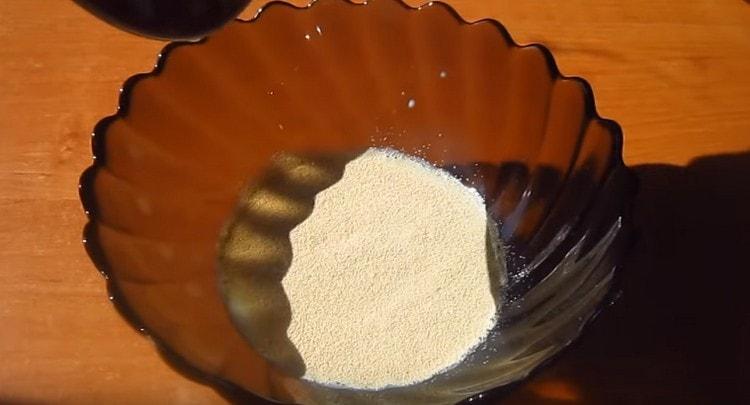 We add yeast to warm milk.