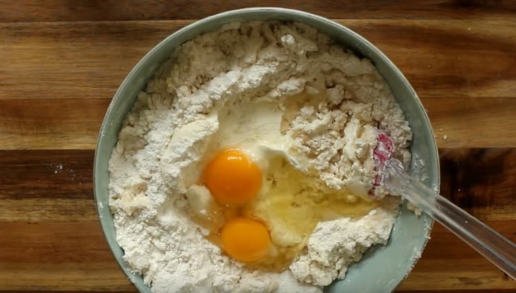 After mixing the ingredients, add sour cream and eggs.