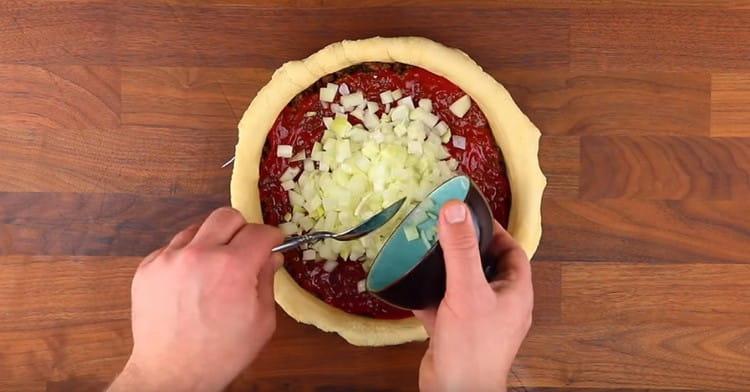 Onion spread on top of the sauce.