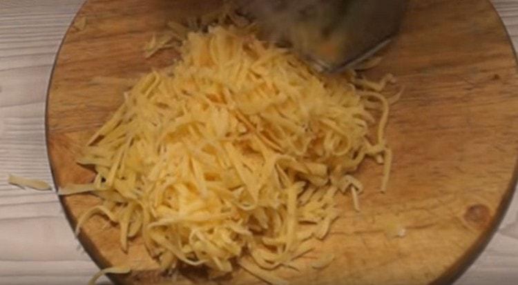 Grate the cheese.