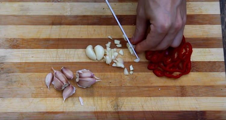 Grind the garlic.