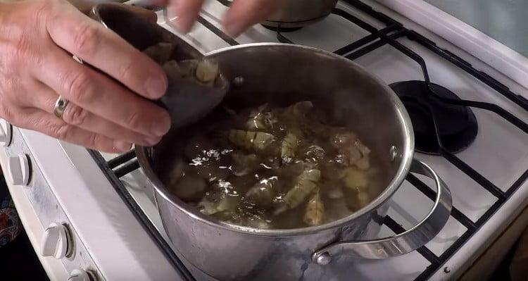 Add the shells of the shrimp.