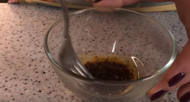 Preparing the sauce for the dish.