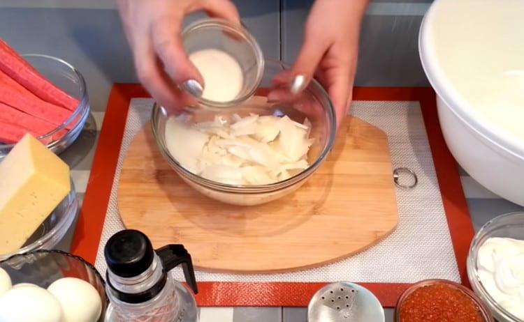 Add sugar and salt to the onion.