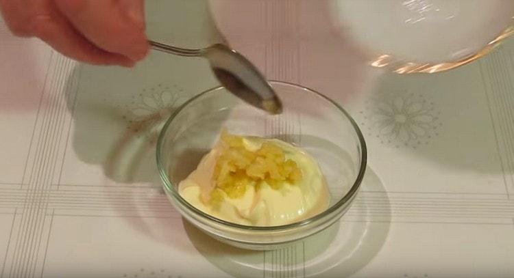 mix mayonnaise with chopped garlic.
