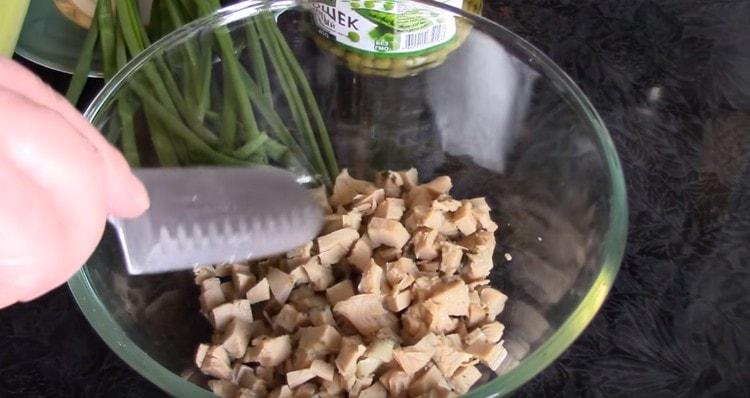 Canned squid cut into cubes.