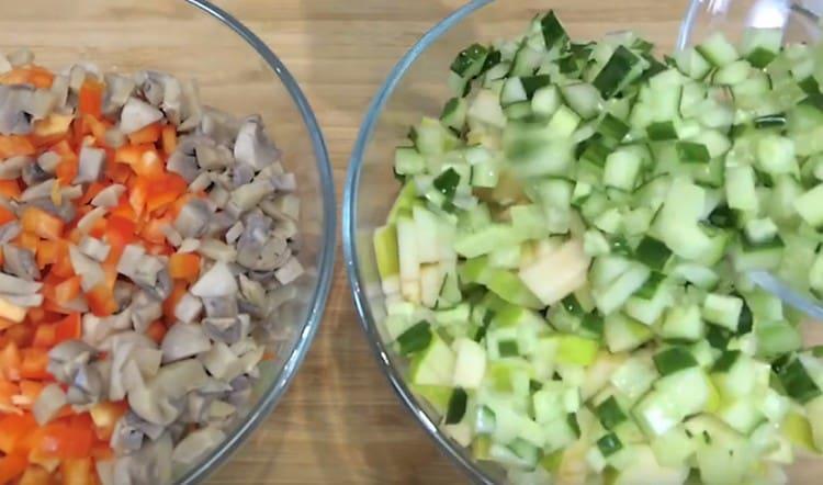 Put apples and cucumbers in another bowl.