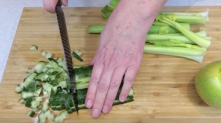 dice fresh cucumbers.