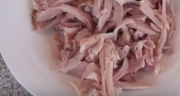 Thinly chop the smoked chicken.