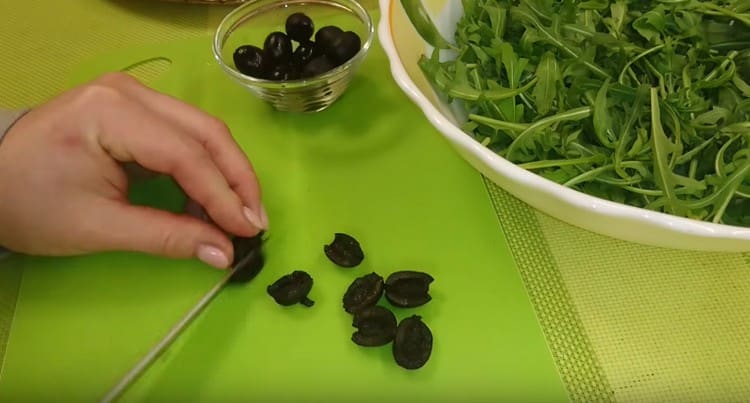 We also cut the olives in half.