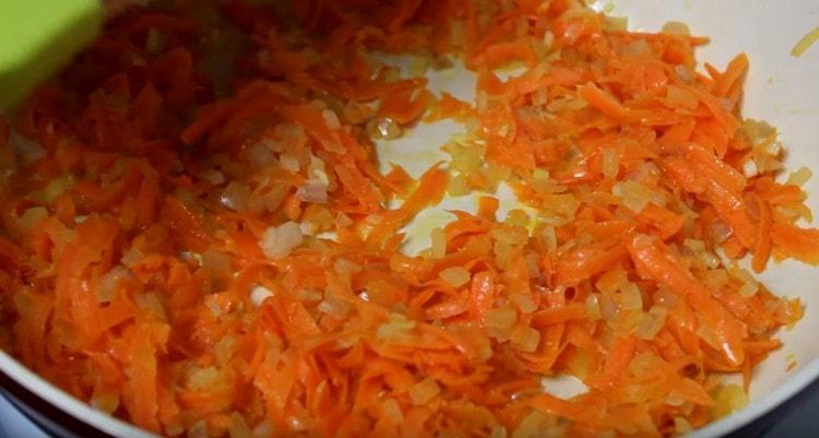 Add carrots to the onion and pass the vegetables together.