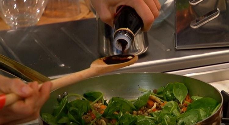 Season salad with balsamic vinegar.