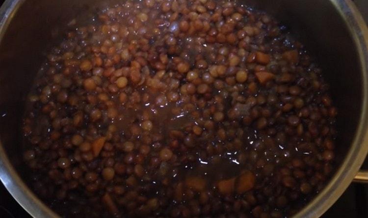 Boil the lentils until tender.