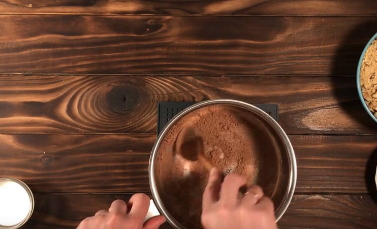 In a saucepan, mix sugar with cocoa.