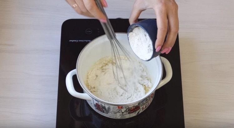 Add flour to the oil.