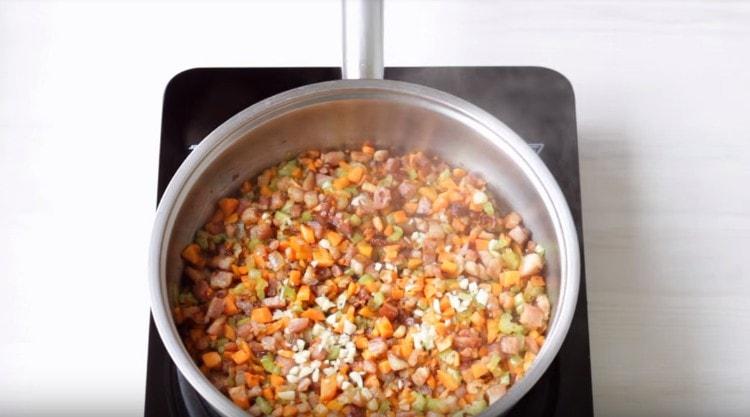 Next, add the garlic.