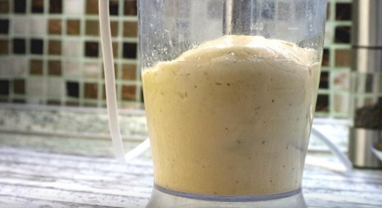 Beat mayonnaise until smooth.