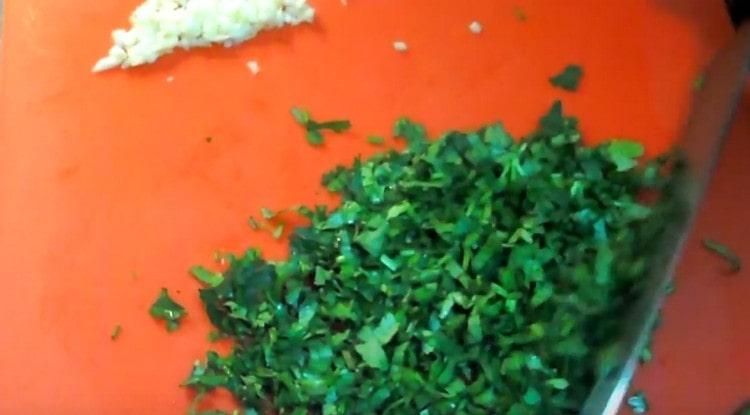 Grind cilantro and garlic.