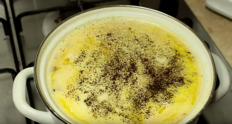 Pepper the soup to taste.