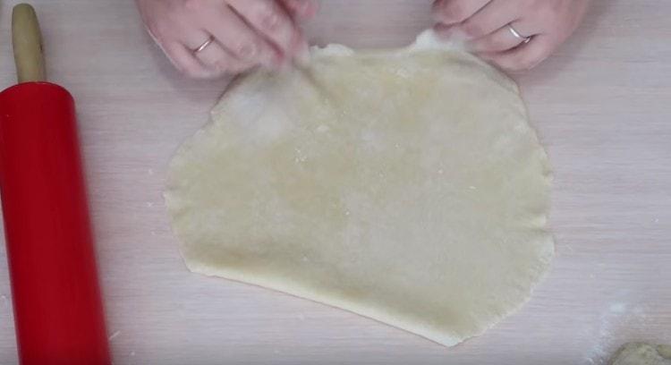 Roll the dough thinly.