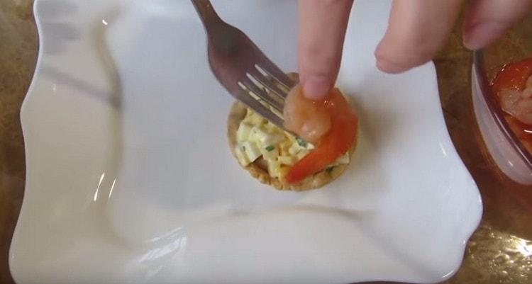 we stuff each tartlet, and spread the shrimp on top.