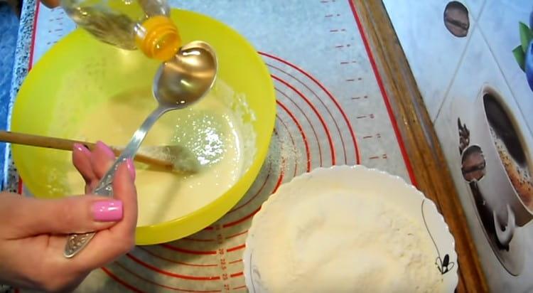 Next, add vegetable oil to the dough.