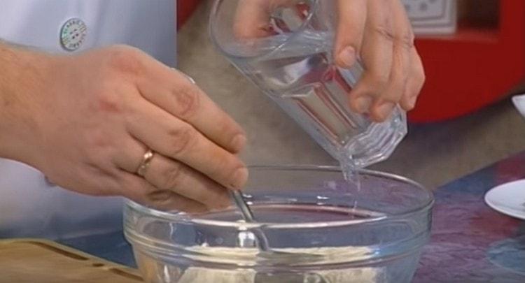 We add warm water to the dry components a little.