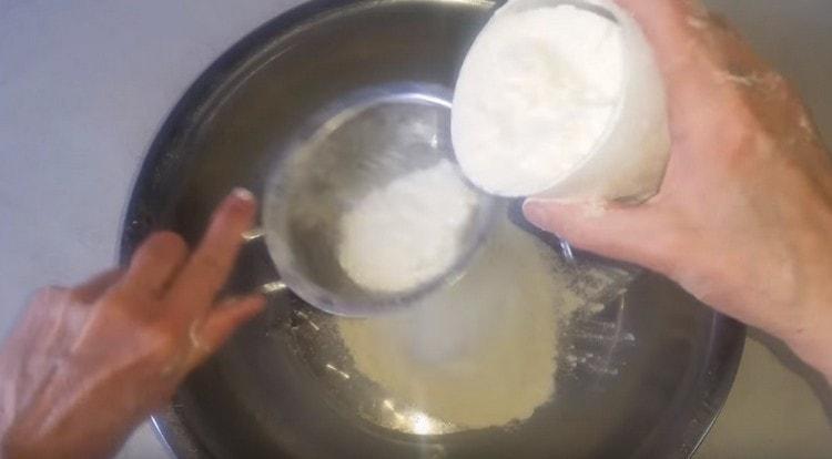 To begin, sift the flour.