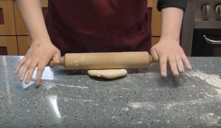 Roll out each part of the dough.