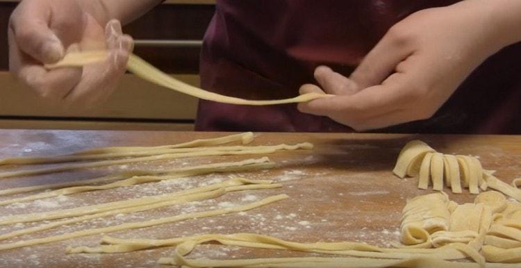 Gently unwrap the noodles.