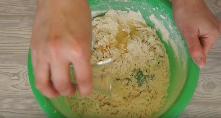 Add vegetable oil to the dough.