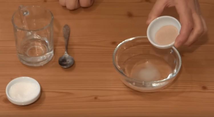 Add sugar and dry yeast to the water.