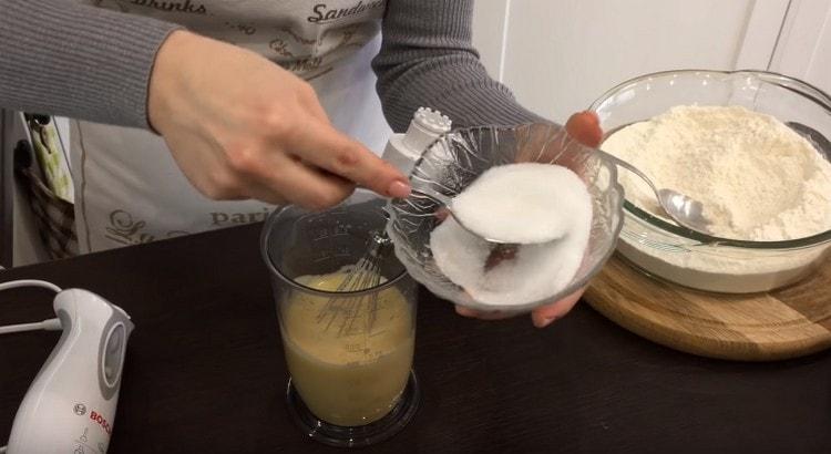 Beat eggs with sugar separately.