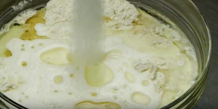 Add salt and sugar to the ingredients in the bowl.