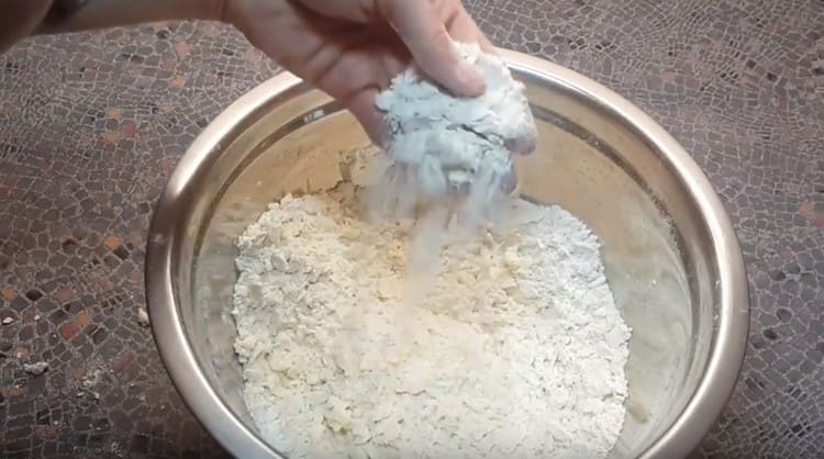 Mash butter with flour into crumbs.