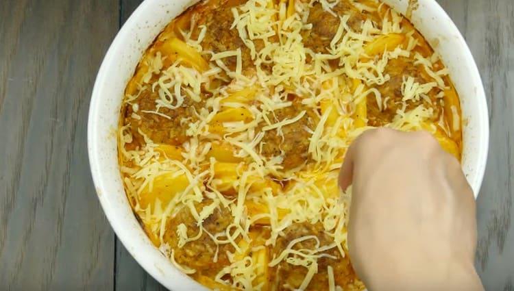 At the end of baking, sprinkle the dish with grated cheese.