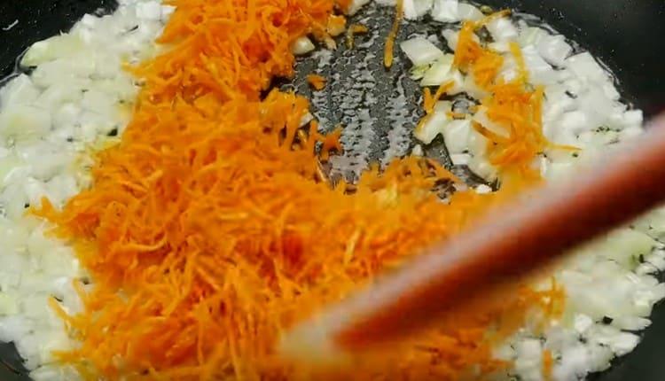 In a pan, fry chopped onions and carrots.