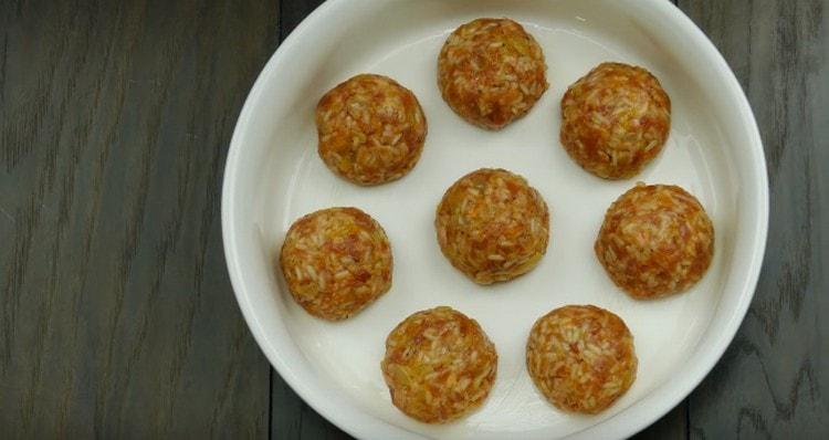 Put the meatballs in a baking dish.