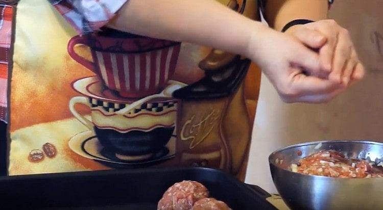 We form meatballs and put them into a deep shape with high sides.