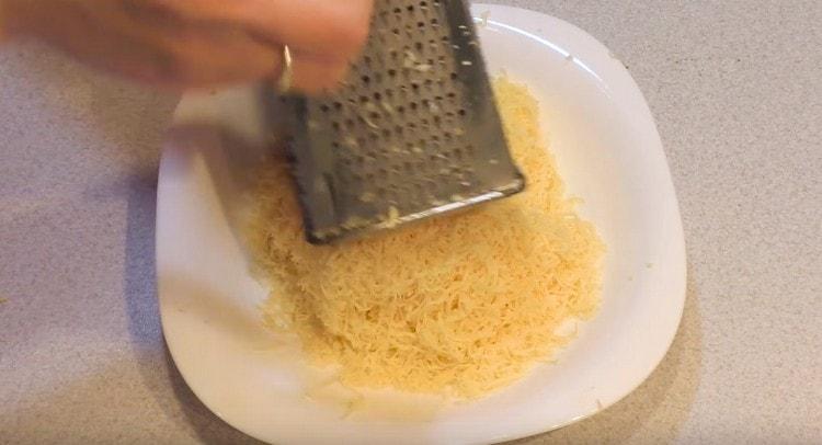 Rub the cheese on a fine grater.