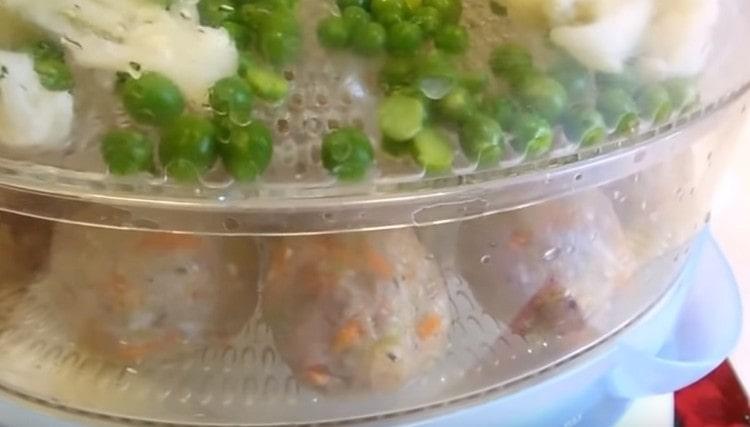 Put the meatballs in the basket of the double boiler.