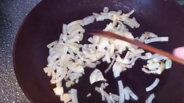 Fry the onion until soft.