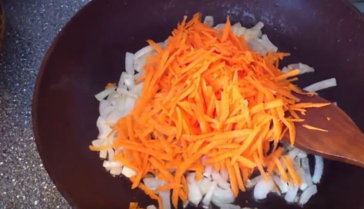 Add carrot to the onion.