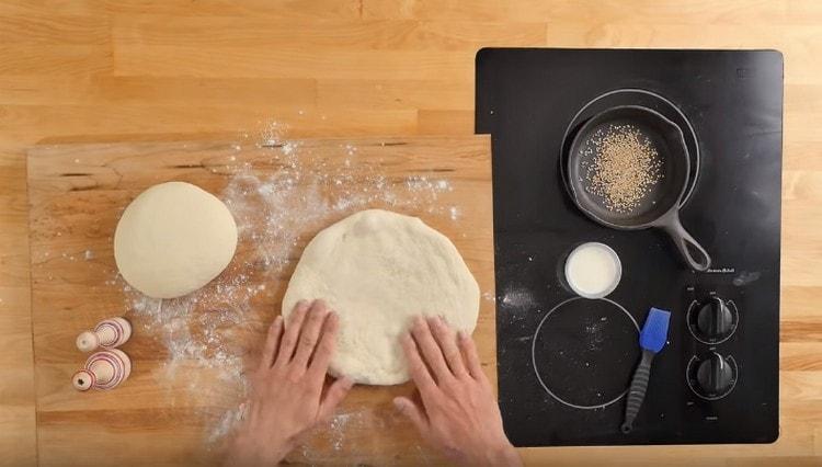 We form round cakes with our hands.