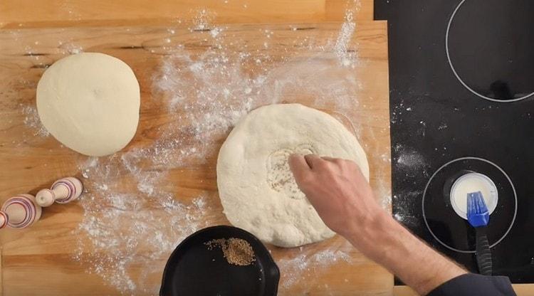 Sprinkle the center of the tortilla with lightly fried sesame seeds.