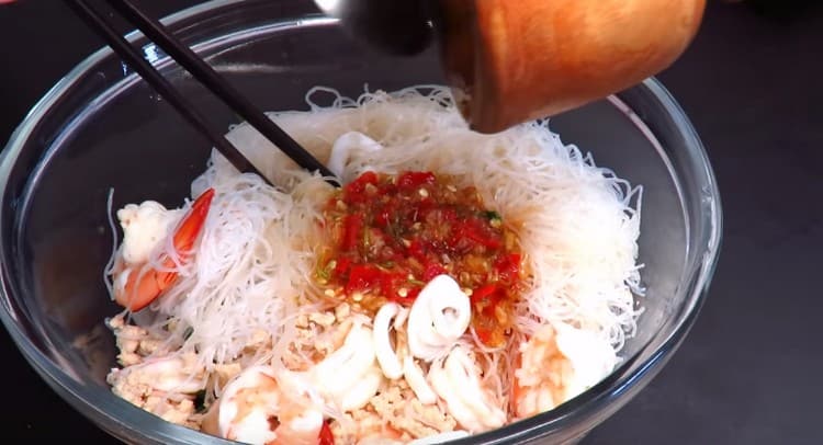 Add dressing and mix the dish well.