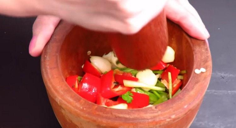 Grind everything with a pestle in a mortar.