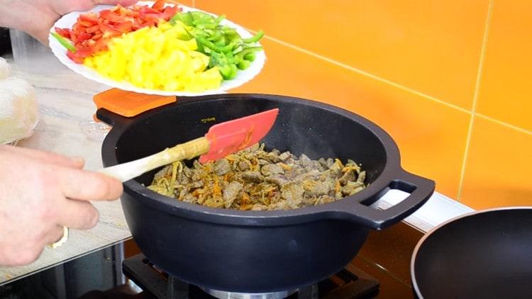 Next, add the bell pepper to the meat.