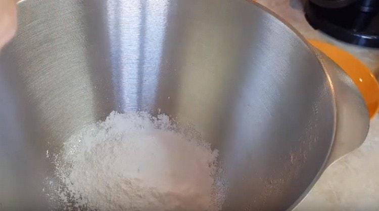 Pour powdered sugar into a bowl.